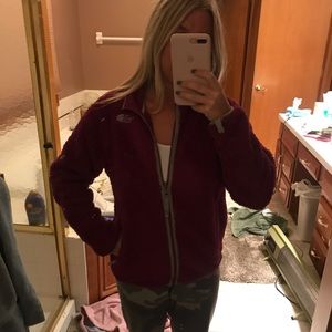 Purple fluffy north face jacket